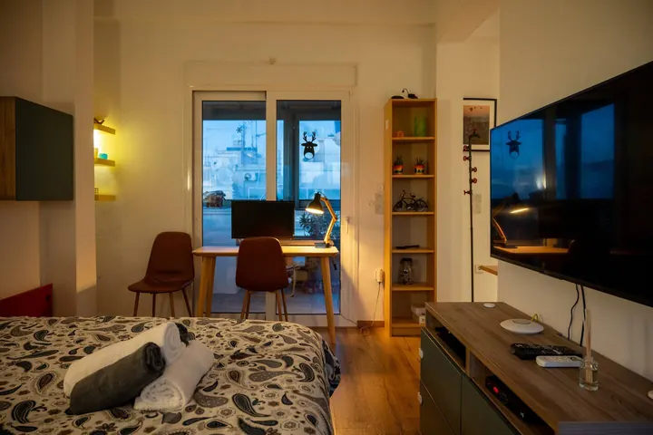 Bright Retreat bedroom and living area with terrace access